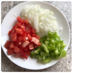 chop vegetables for egg pasta